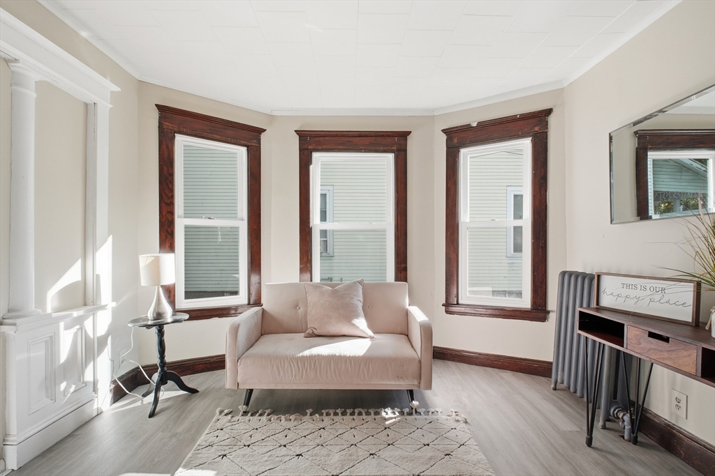 51-53 Abbe Avenue Springfield, MA 01107 - Photo 6 of 42 a living room with furniture and a window