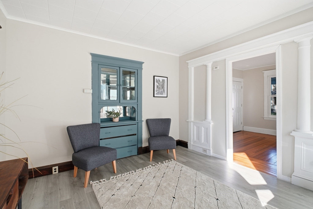 51-53 Abbe Avenue Springfield, MA 01107 - Photo 7 of 42 a living room with furniture and a chair