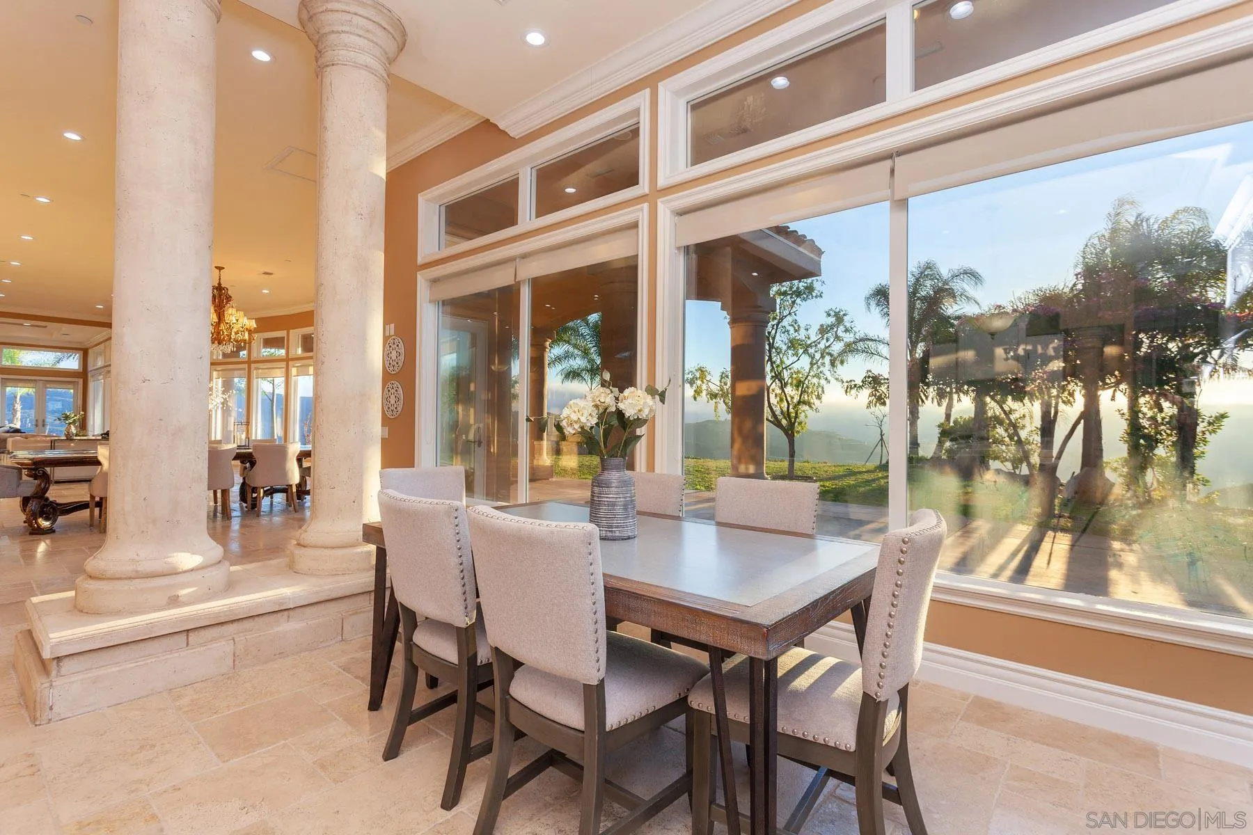 29314 Twin Oaks Valley Road Vista, CA 92084 - Photo 16 of 74 a view of a dining room with furniture and wooden floor