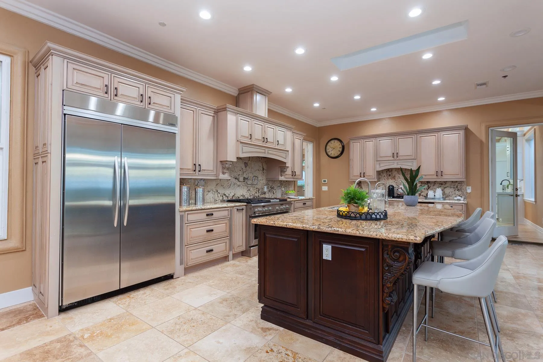 29314 Twin Oaks Valley Road Vista, CA 92084 - Photo 46 of 74 a kitchen with stainless steel appliances granite countertop a sink a stove a refrigerator and island