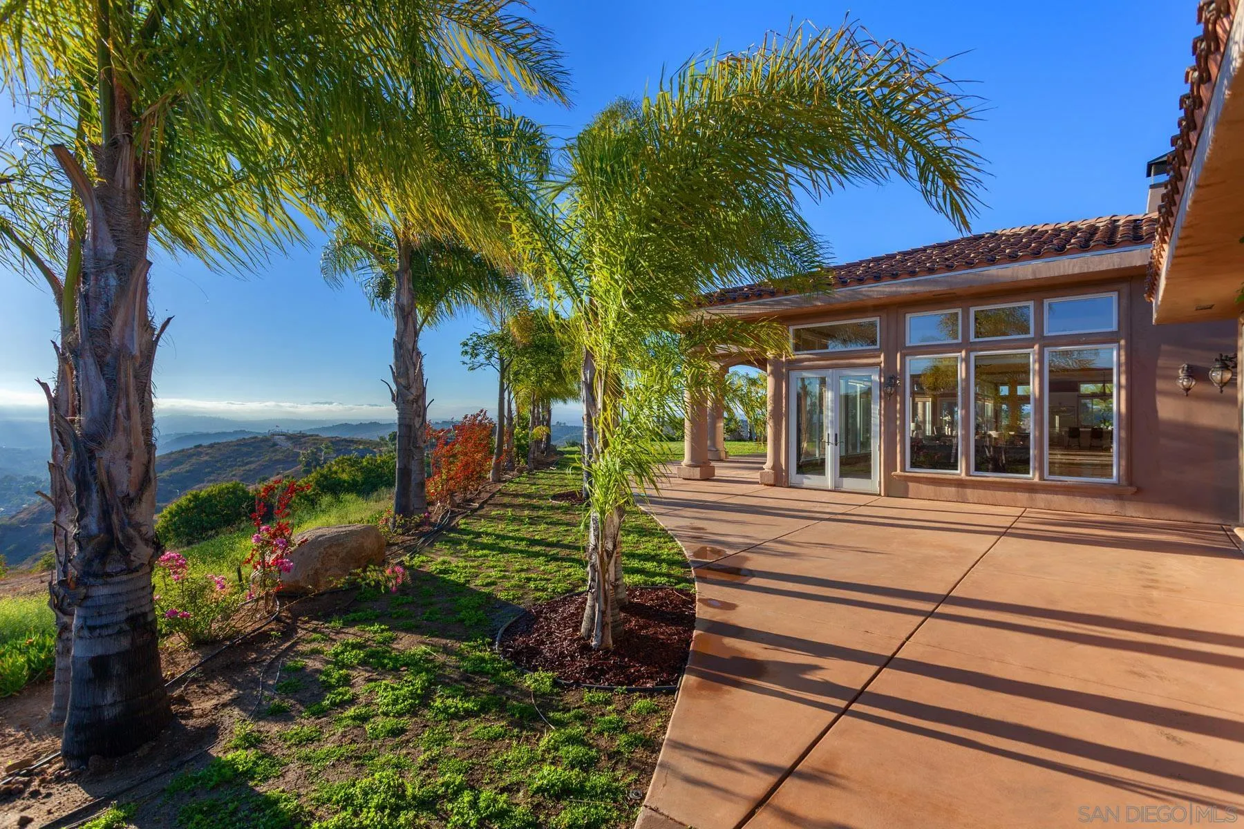 29314 Twin Oaks Valley Road Vista, CA 92084 - Photo 52 of 74 a view of a house with a patio