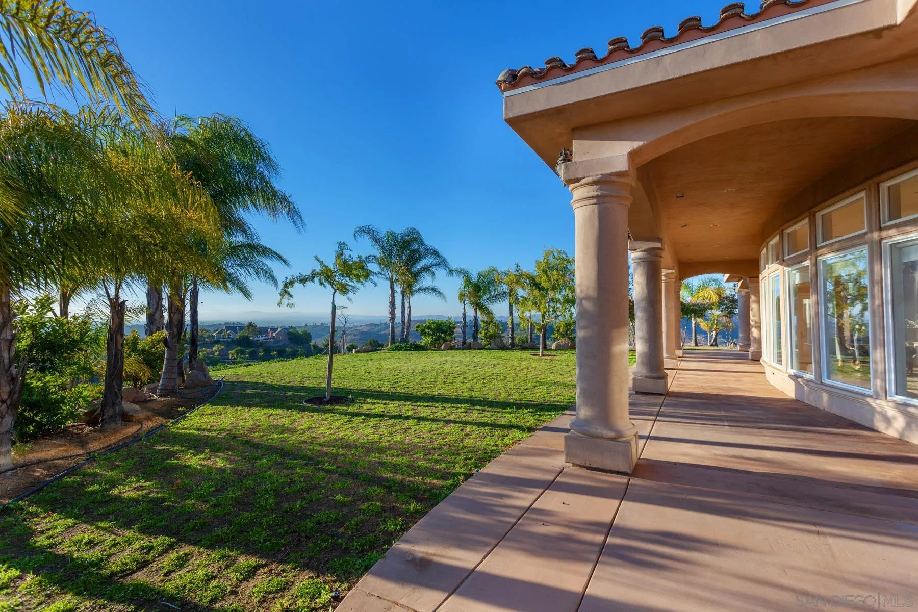 29314 Twin Oaks Valley Road Vista, CA 92084 - Photo 53 of 74 a view of a house with a yard