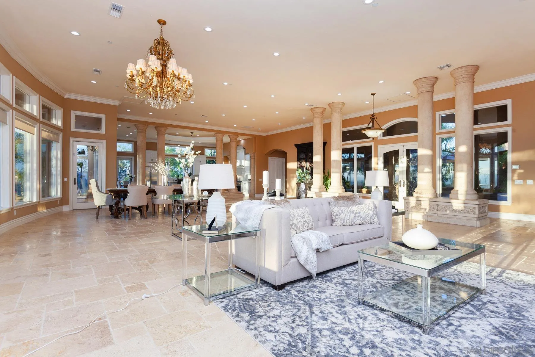 29314 Twin Oaks Valley Road Vista, CA 92084 - Photo 6 of 74 a living room with furniture and a chandelier