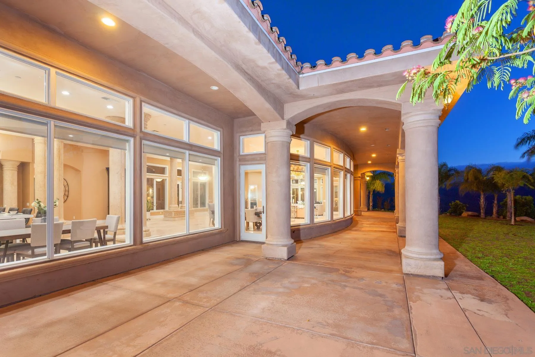 29314 Twin Oaks Valley Road Vista, CA 92084 - Photo 61 of 74 a view of lobby with a floor to ceiling window and a table