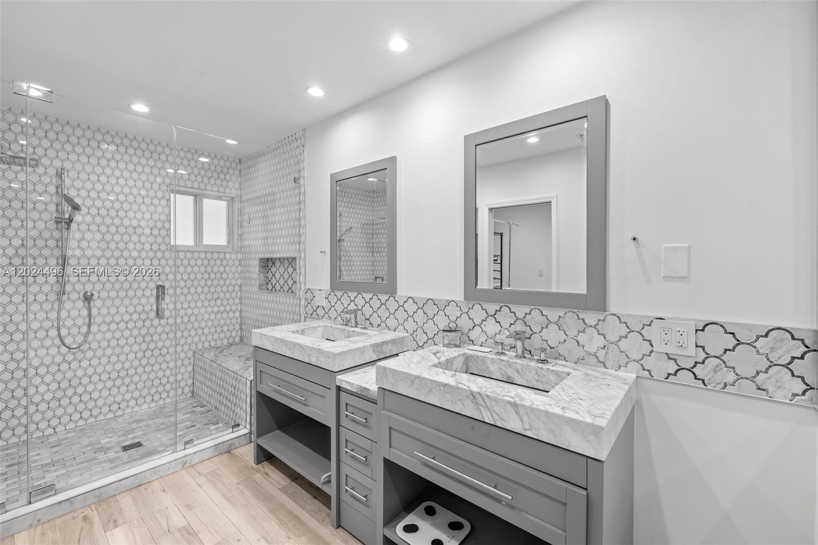 6875 North Cartee Road Palmetto Bay, FL 33158 - Photo 26 of 42 a bathroom with a sink and a mirror