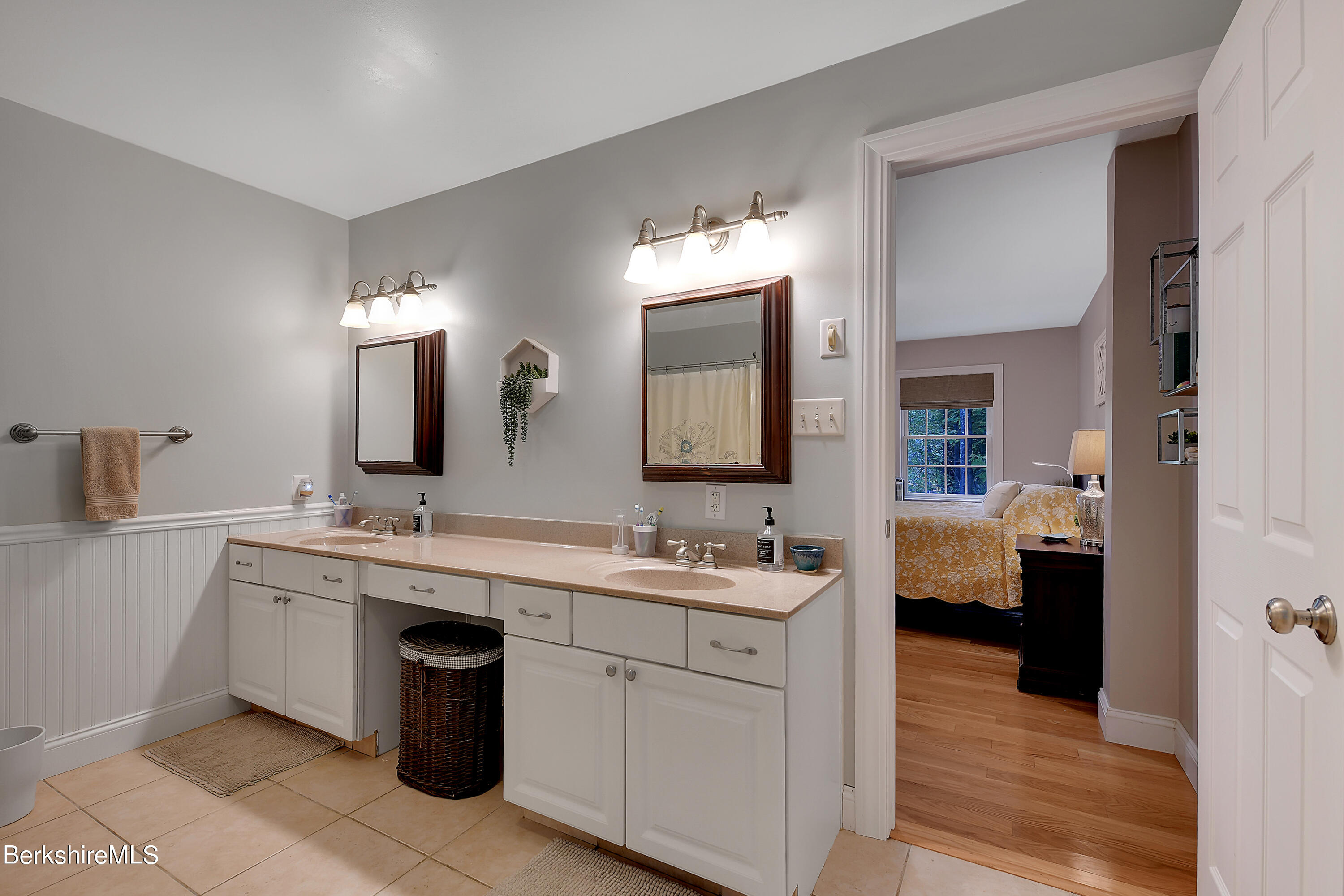 3 Ridge Street Tyringham, MA 01238 - Photo 19 of 38 a spacious bathroom with a double vanity sink mirror and toilet