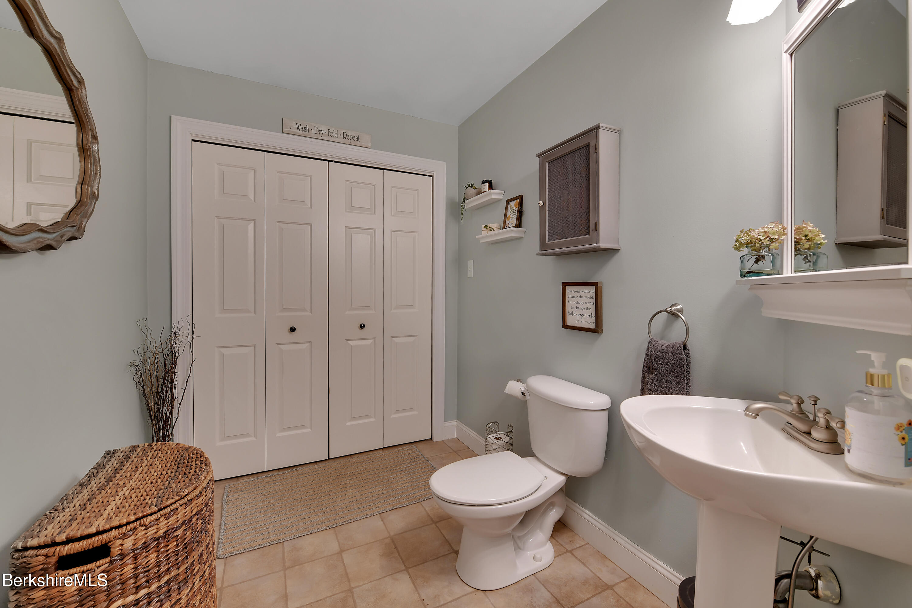 3 Ridge Street Tyringham, MA 01238 - Photo 20 of 38 a bathroom with a toilet a sink and mirror