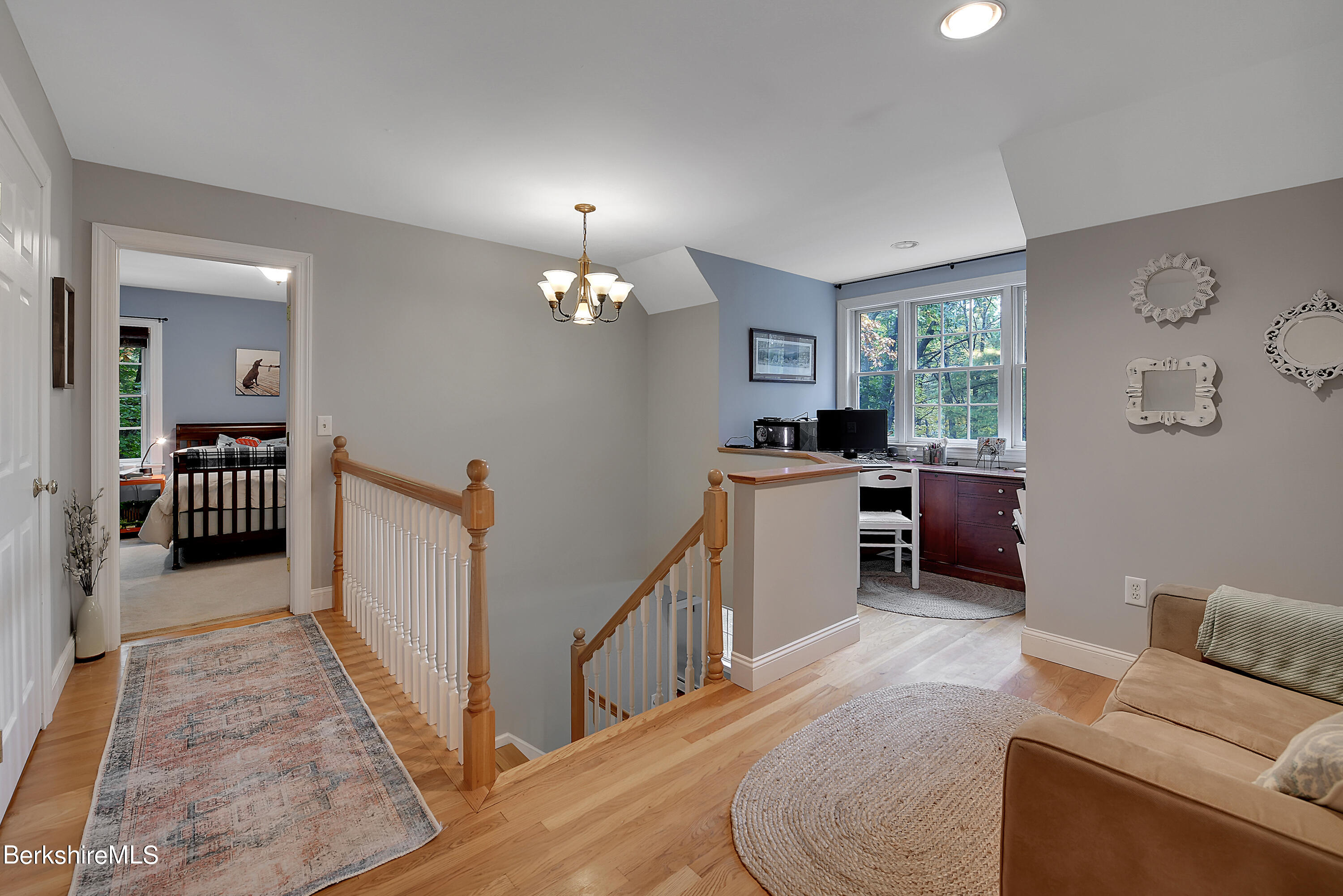 3 Ridge Street Tyringham, MA 01238 - Photo 22 of 38 a living room with furniture and a wooden floor