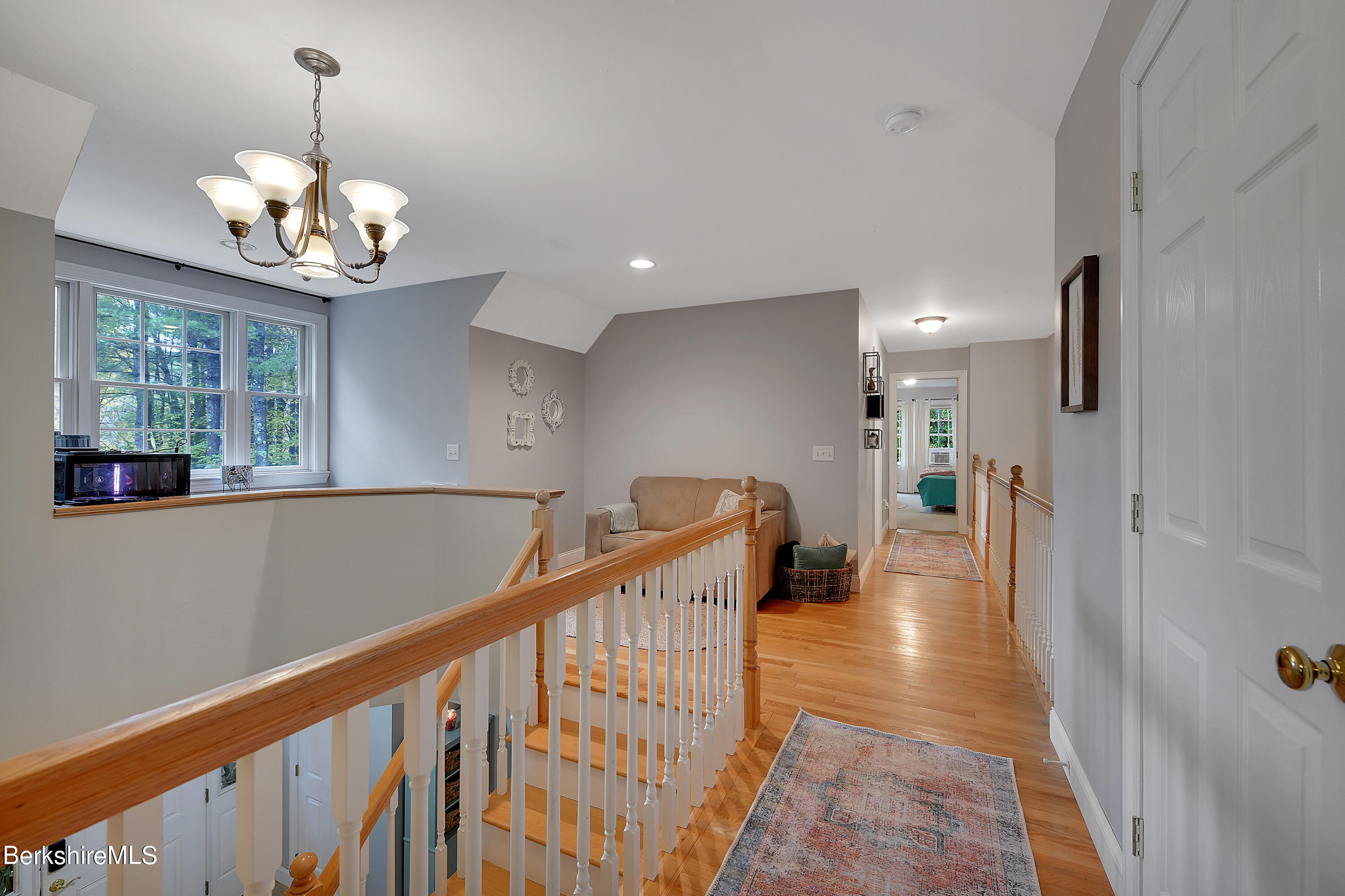 3 Ridge Street Tyringham, MA 01238 - Photo 23 of 38 a view of a chandelier and wooden floor