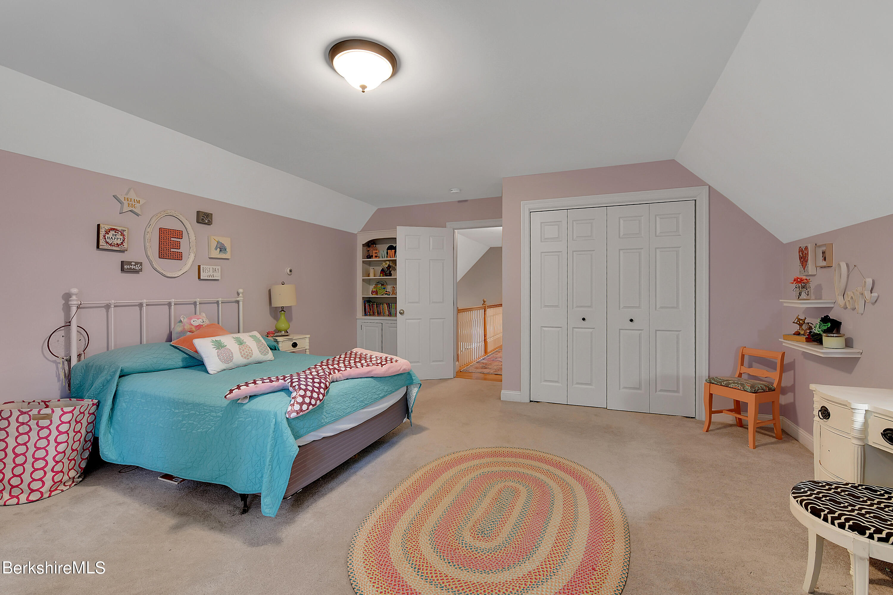 3 Ridge Street Tyringham, MA 01238 - Photo 28 of 38 a bedroom with a bed and a chair
