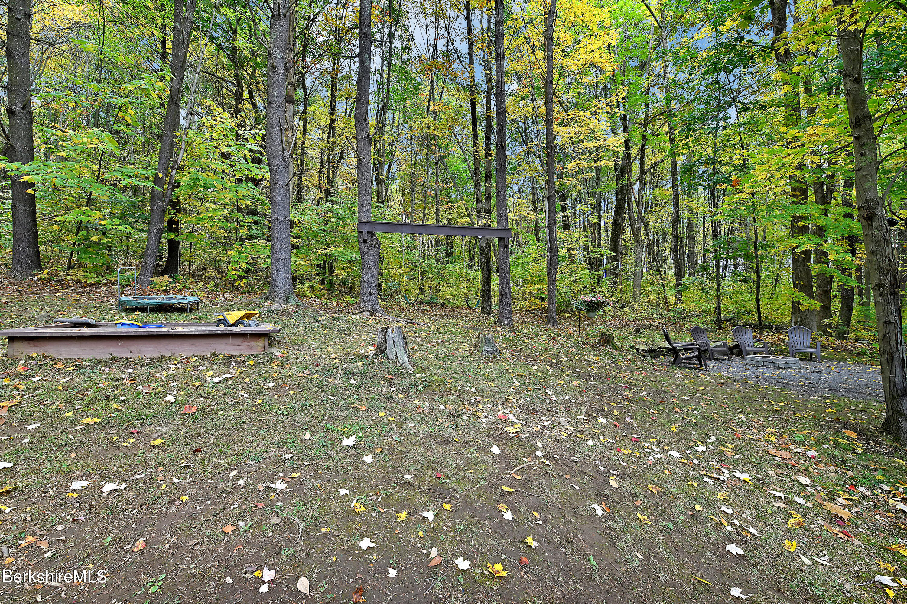 3 Ridge Street Tyringham, MA 01238 - Photo 33 of 38 a backyard of a house with lots of green space