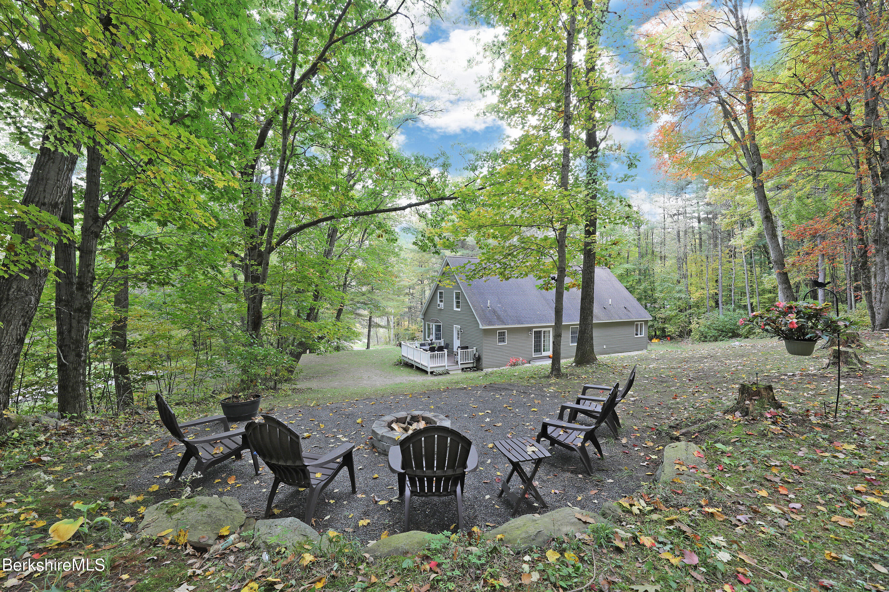 3 Ridge Street Tyringham, MA 01238 - Photo 34 of 38 a view of a chairs and table in the backyard
