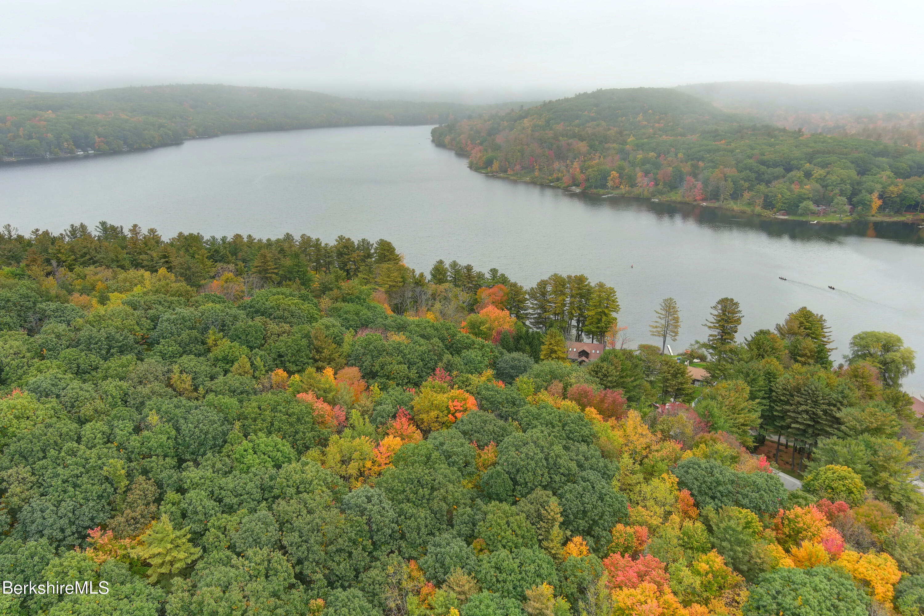3 Ridge Street Tyringham, MA 01238 - Photo 37 of 38 a view of a lake with a mountain in the background