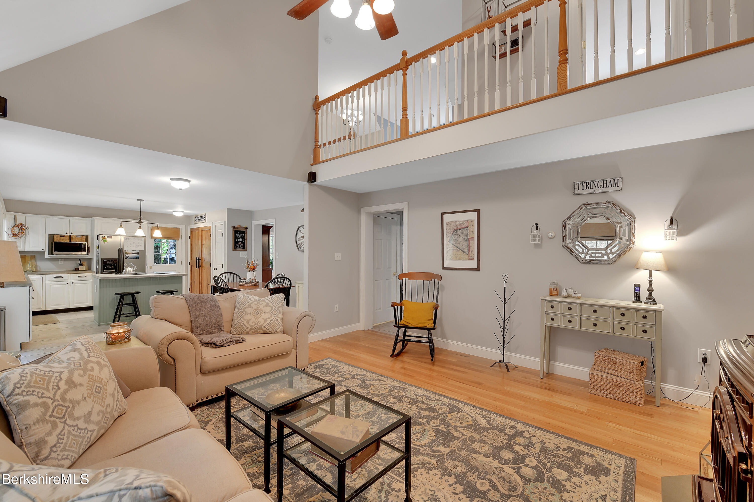 3 Ridge Street Tyringham, MA 01238 - Photo 7 of 38 a living room with furniture a rug and kitchen view