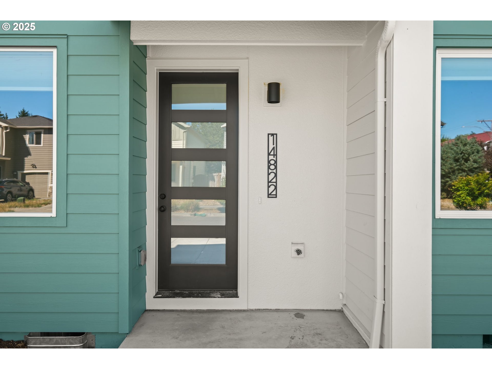 14822 Northeast Couch Street, Unit 4 Portland, OR 97230 - Photo 1 of 42 a view of wooden door