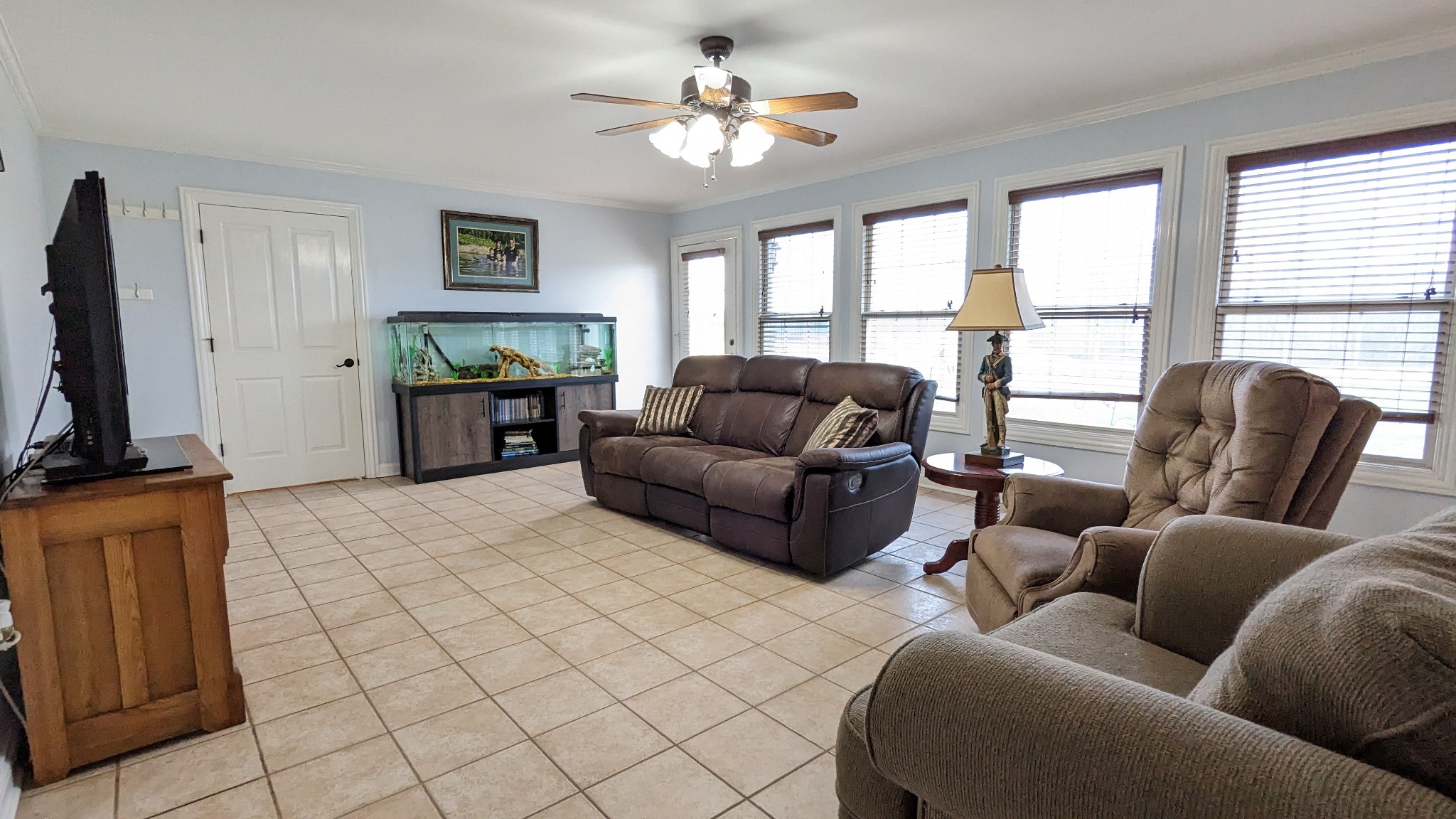 106 Mitchell Road Portland, TN 37148 - Photo 54 of 61 a living room with furniture fireplace and a flat screen tv