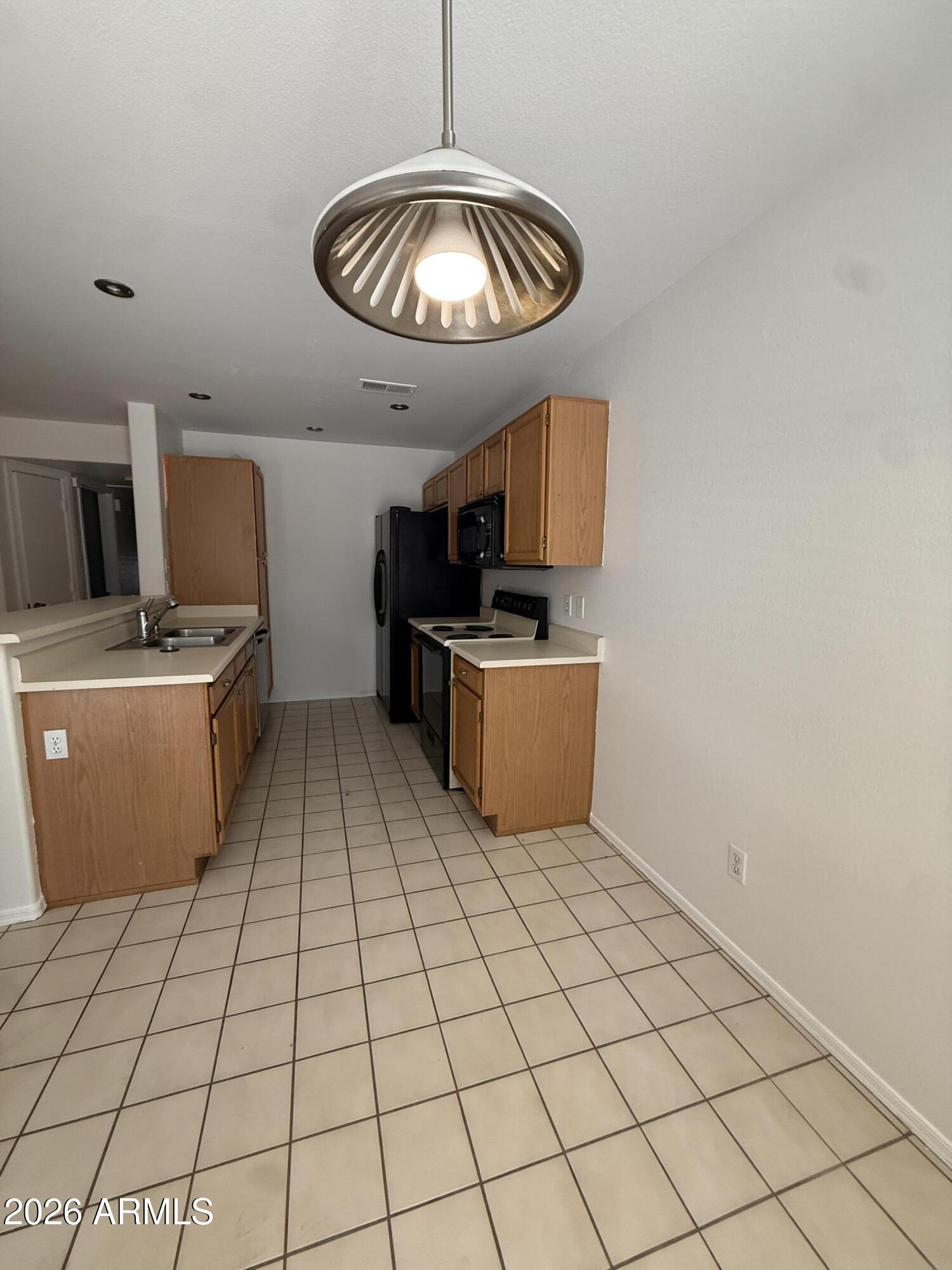 255 South Kyrene Road, Unit 140 Chandler, AZ 85226 - Photo 7 of 19 Dining to Kitchen