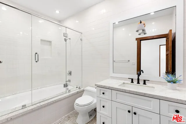 a front view of house with yard and swimming pool