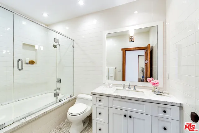 a view of house with backyard and a tub