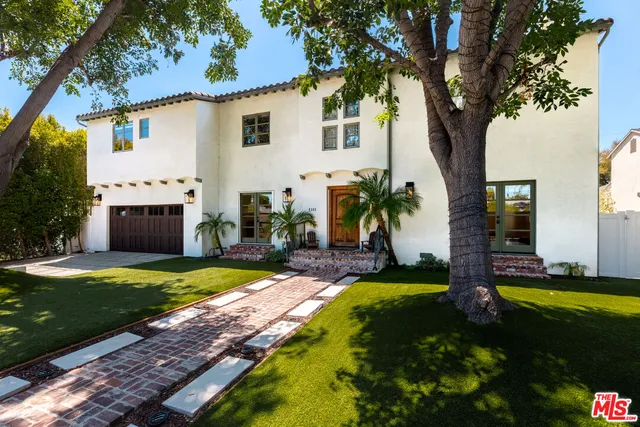a front view of house with garage