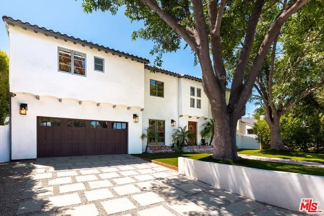a potted plants in front of a house