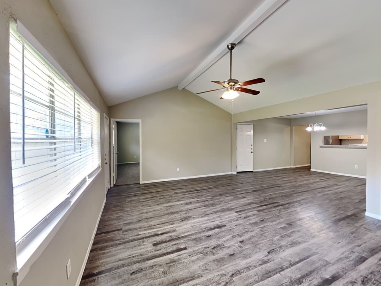 3631 Dawnwood Drive Spring, TX 77380 - Photo 5 of 14 a view of a livingroom with a ceiling fan and window