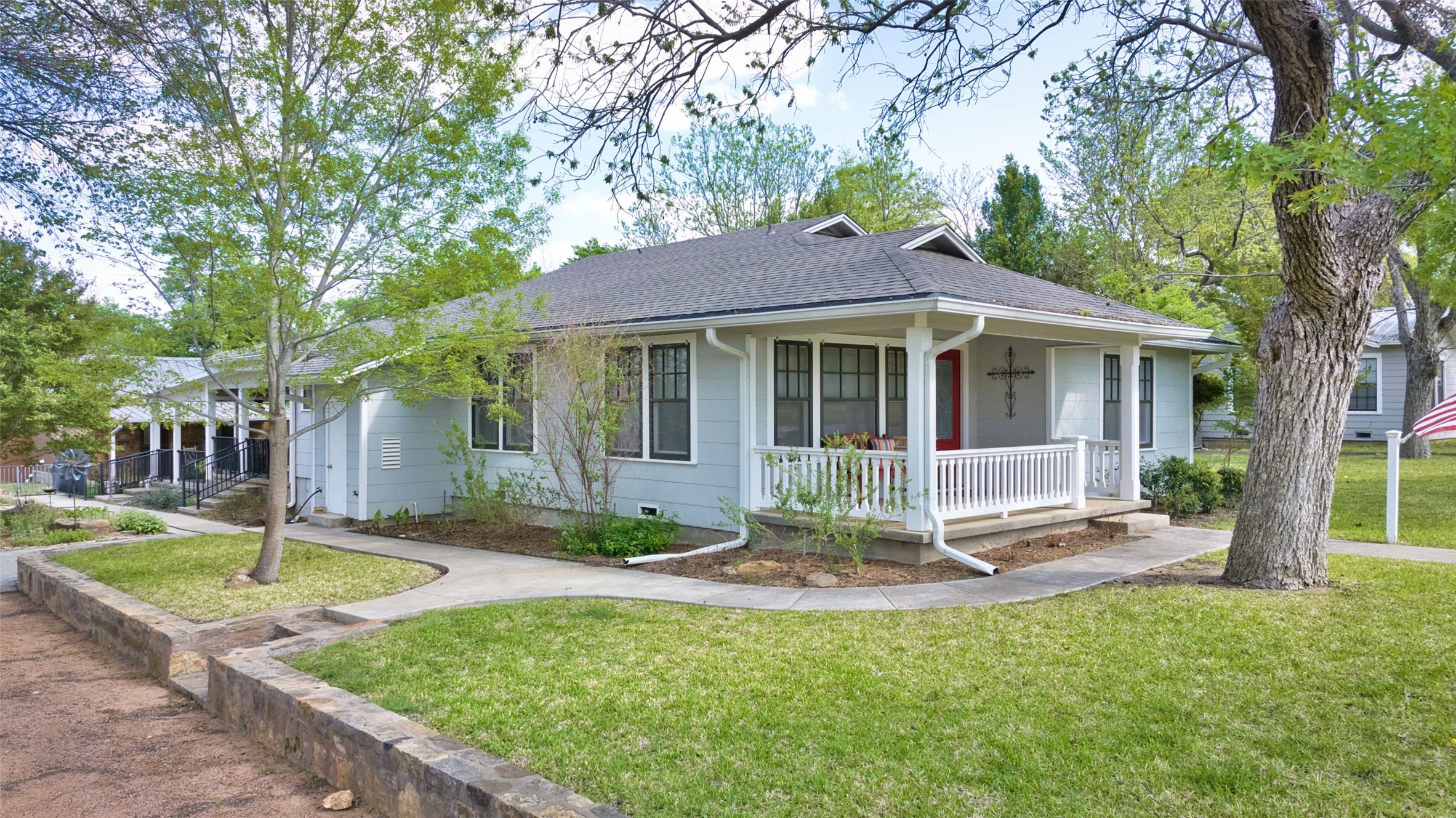 761 Post Hill Street Mason, TX 76856 - Photo 1 of 25 a front view of a house with garden