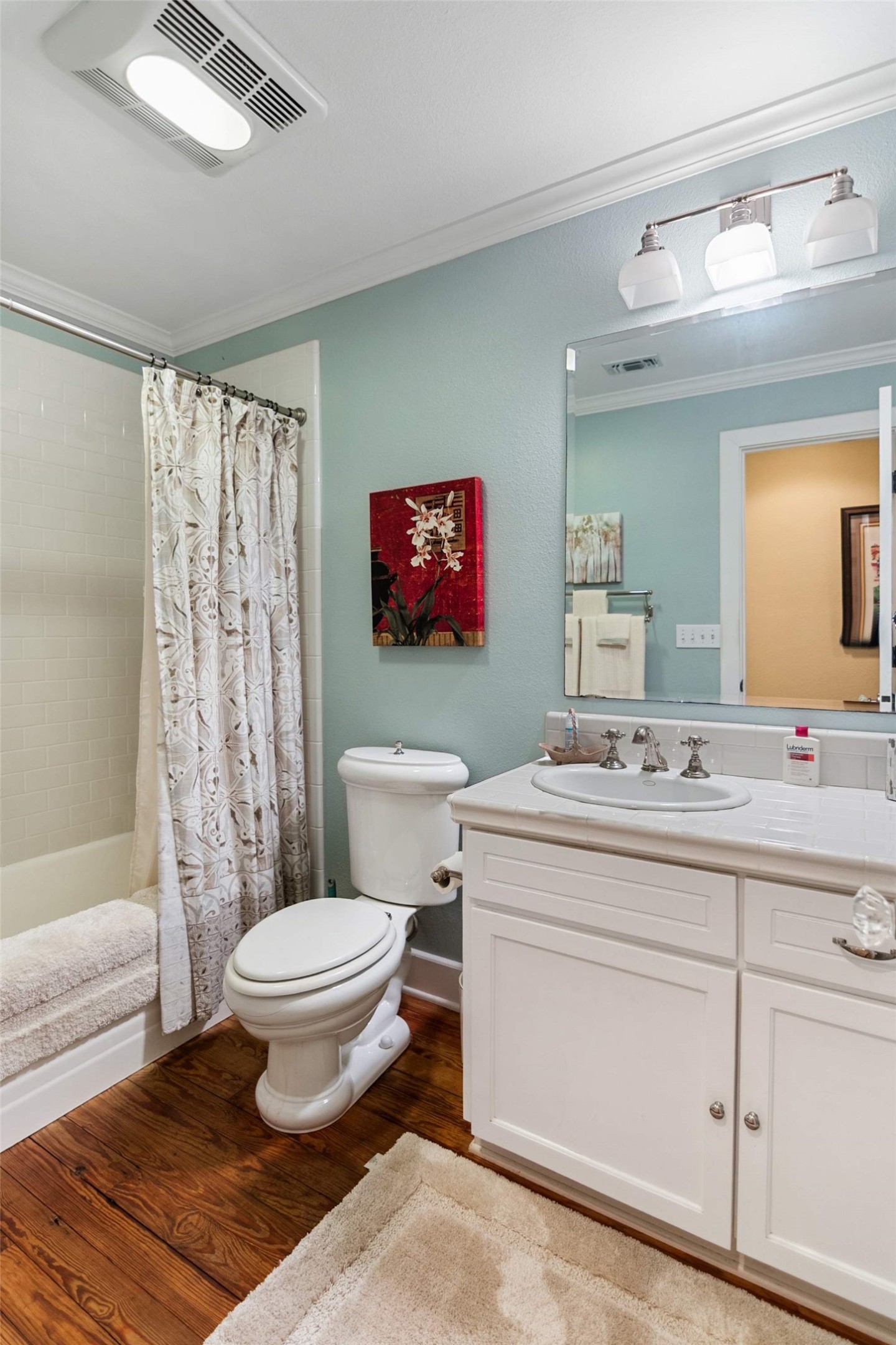 761 Post Hill Street Mason, TX 76856 - Photo 11 of 25 a bathroom with a toilet a sink and a mirror