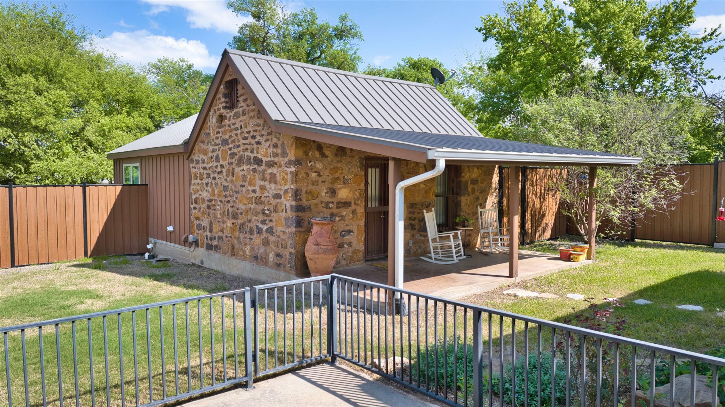 761 Post Hill Street Mason, TX 76856 - Photo 19 of 25 a view of a porch with a small yard