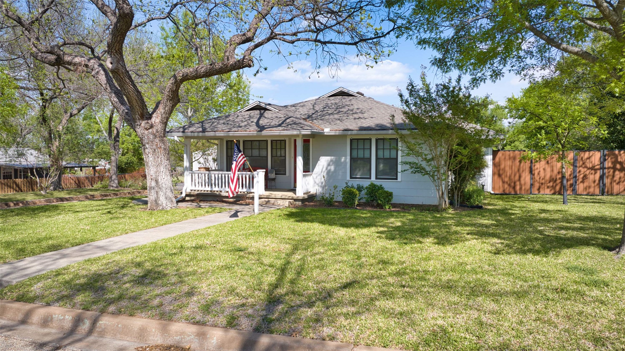 761 Post Hill Street Mason, TX 76856 - Photo 2 of 25 a view of a house with backyard and sitting area