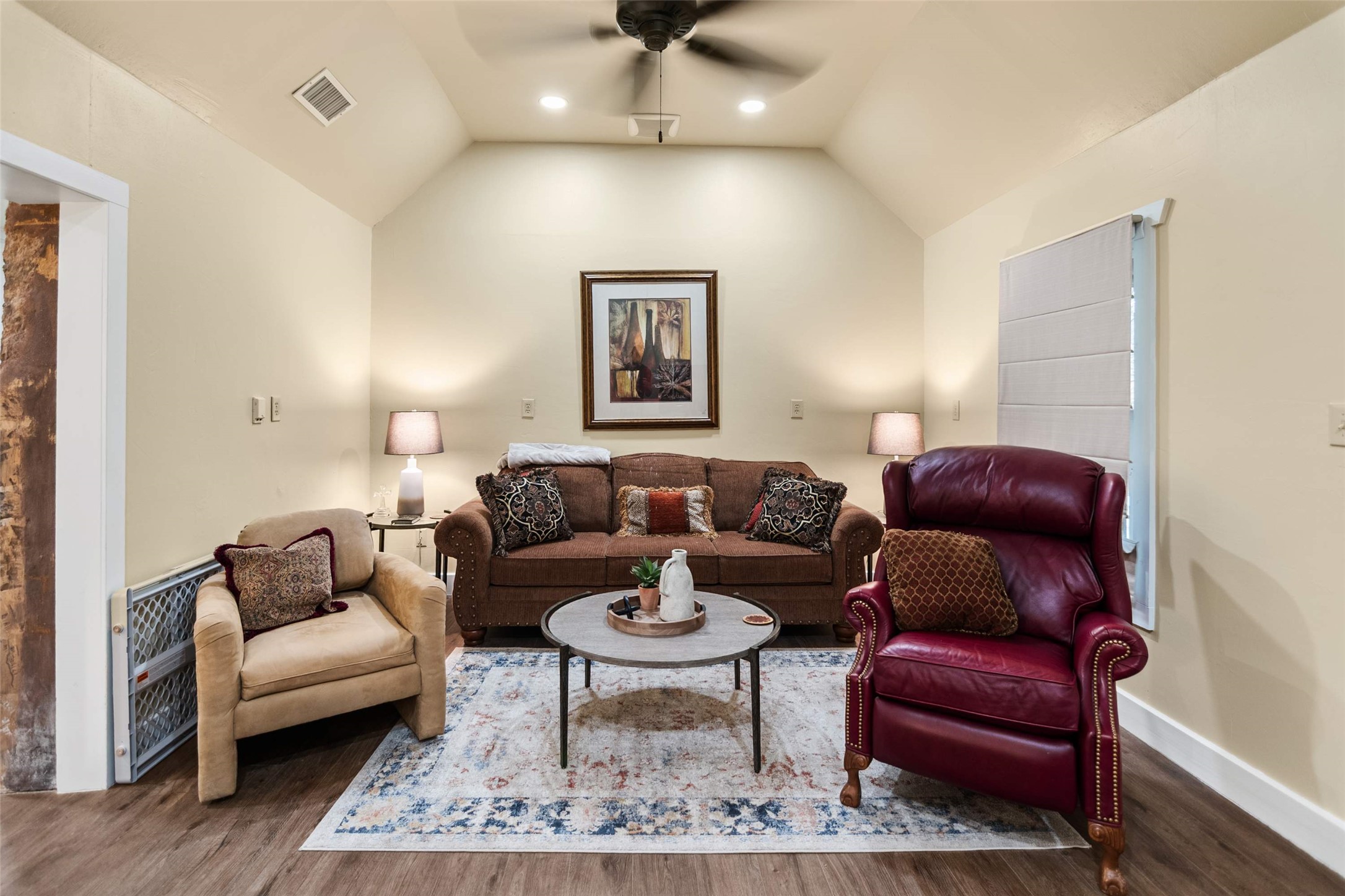 761 Post Hill Street Mason, TX 76856 - Photo 21 of 25 a living room with furniture a rug and a painting