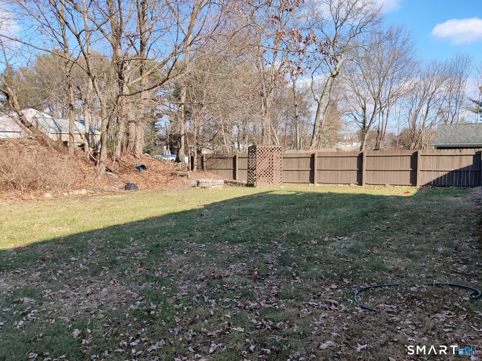 100 Loftus Circle Bridgeport, CT 06606 - Photo 15 of 16 a view of a yard with large trees
