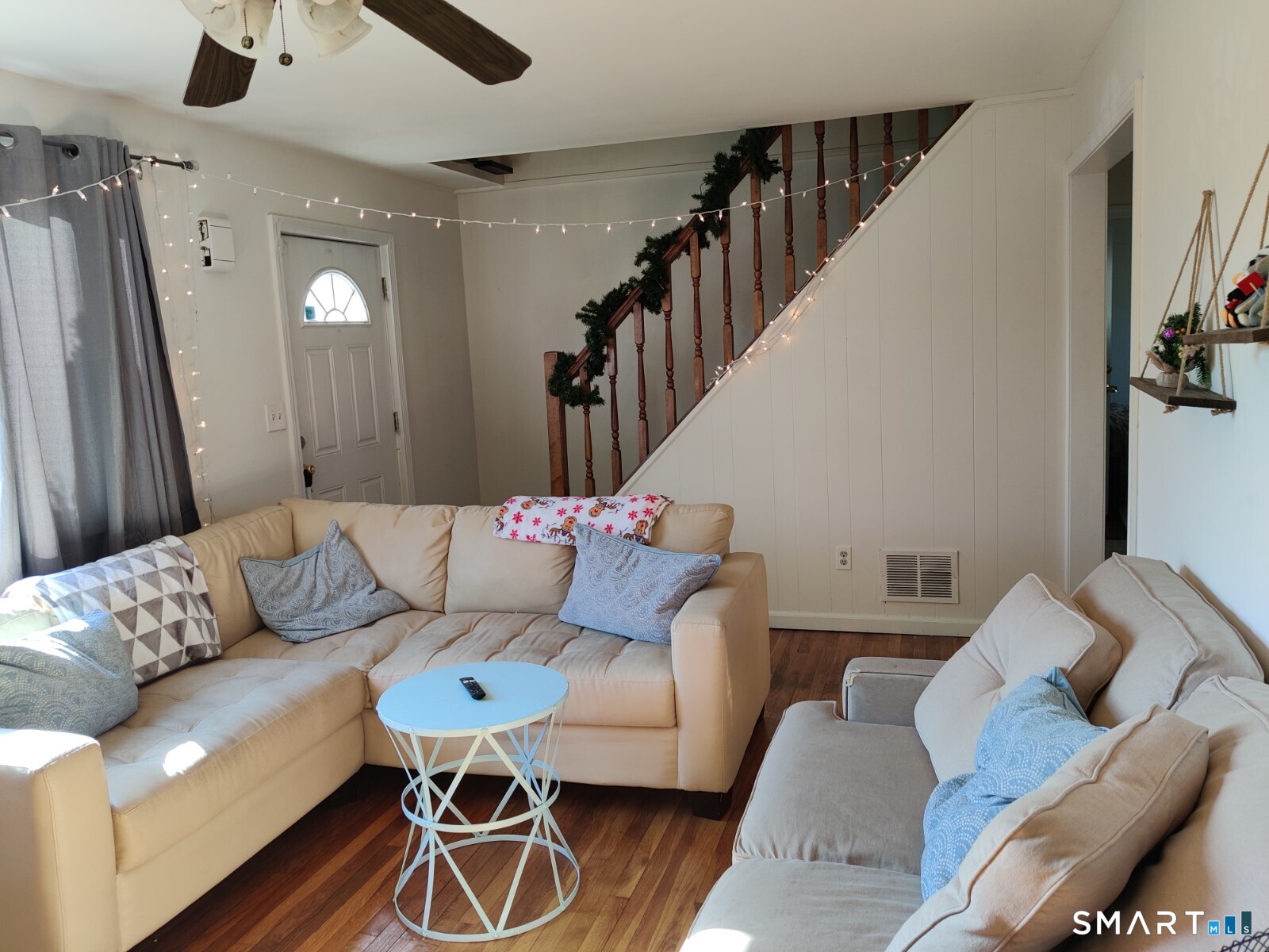 100 Loftus Circle Bridgeport, CT 06606 - Photo 2 of 16 a living room with furniture and a rug