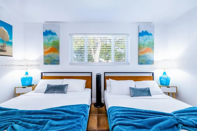 a living room with furniture and a gate