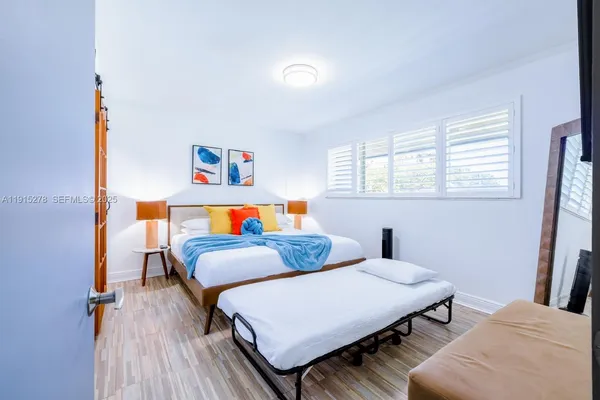 a room with furniture and a window