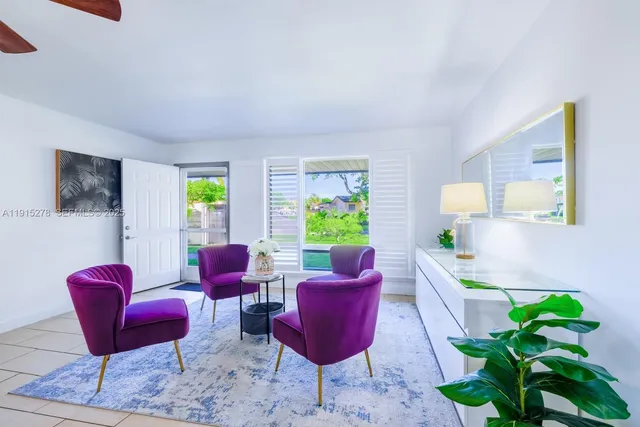 a living room with furniture and a rug