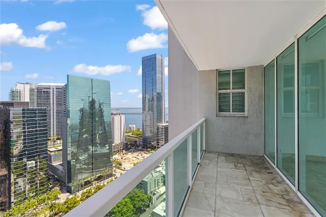 a balcony with view of city
