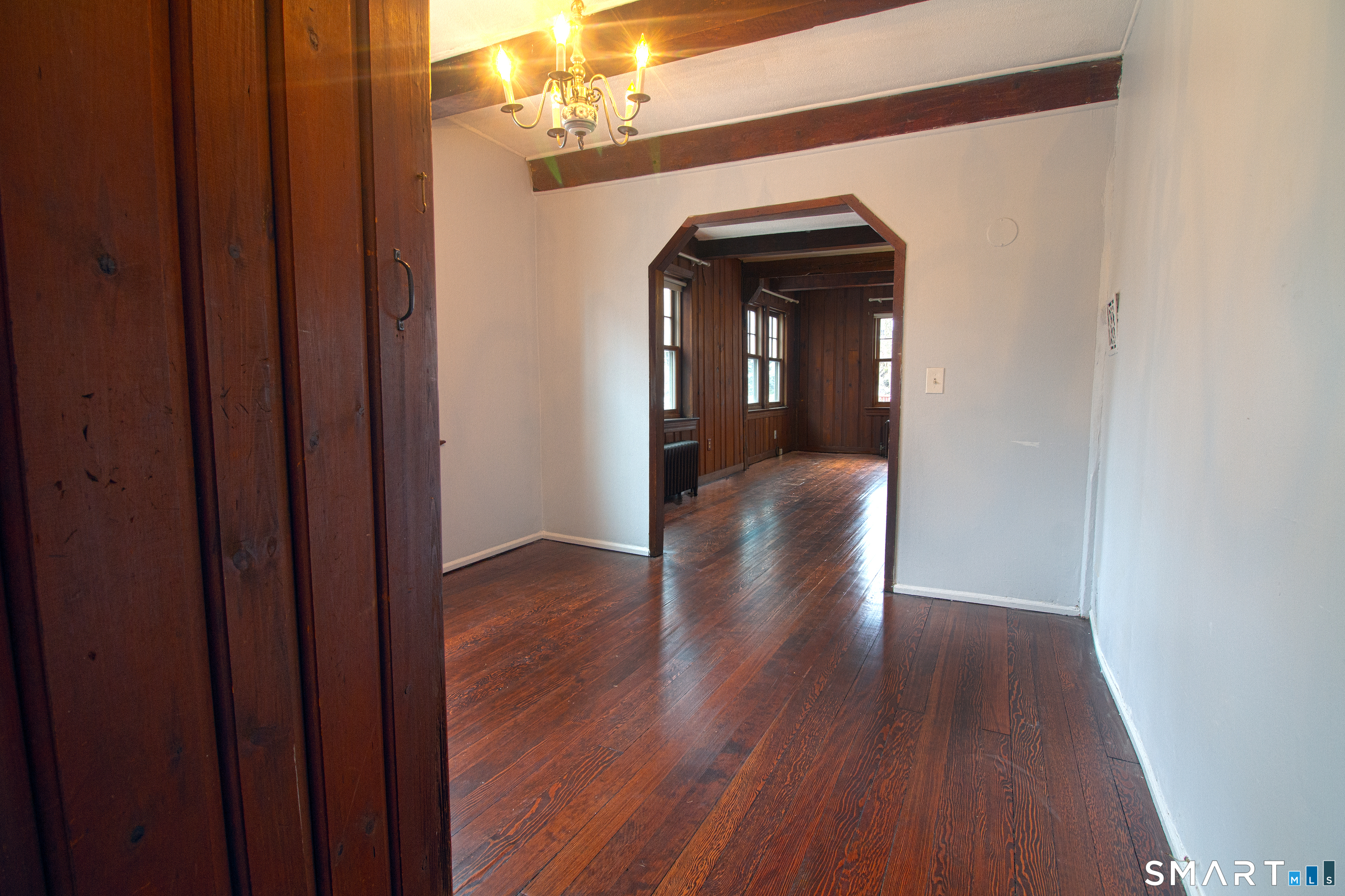 21 B Hoydens Hill Road Fairfield, CT 06824 - Photo 11 of 39 a view of a hallway with wooden floor and staircase