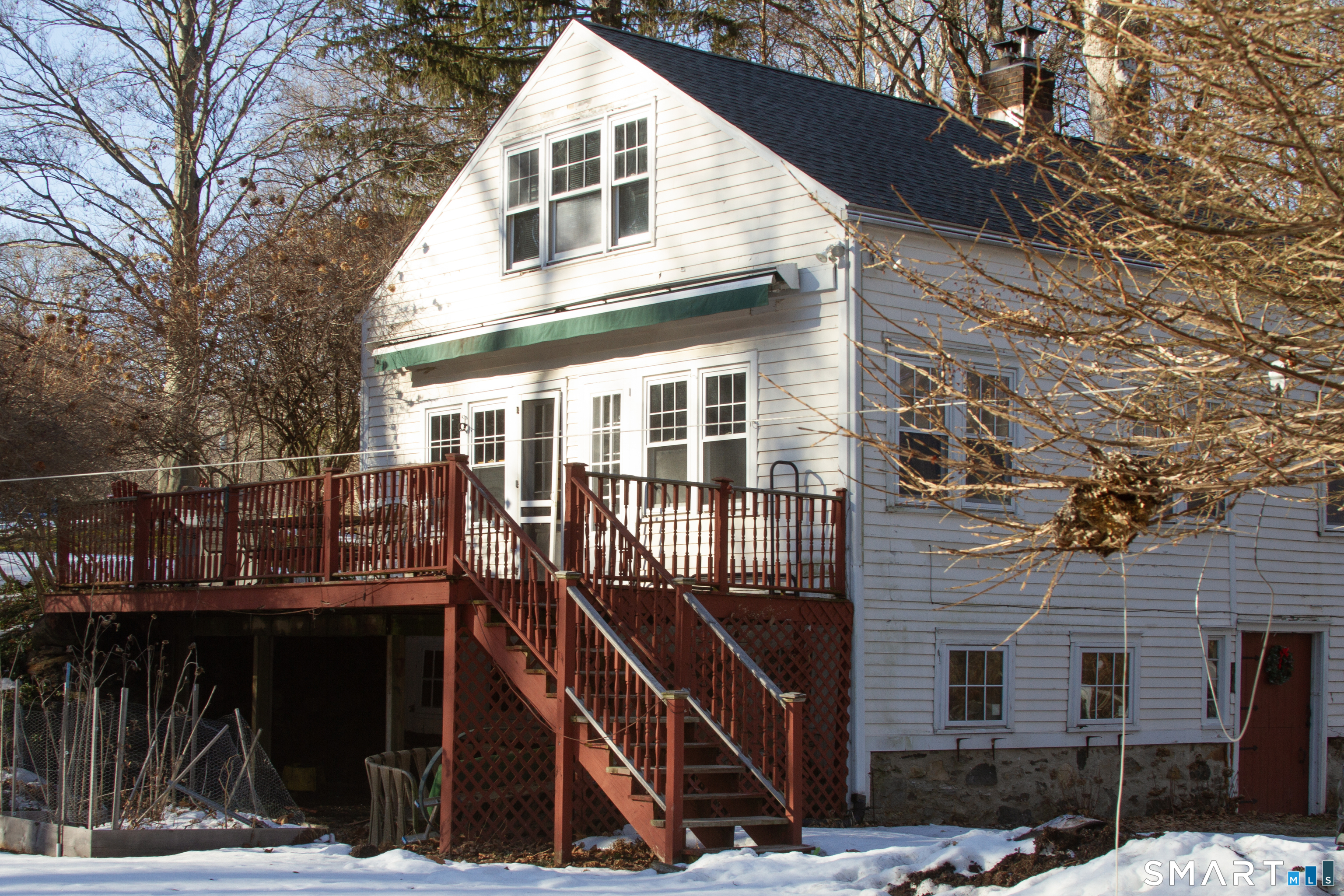 21 B Hoydens Hill Road Fairfield, CT 06824 - Photo 3 of 39 a view of a house with wooden fence