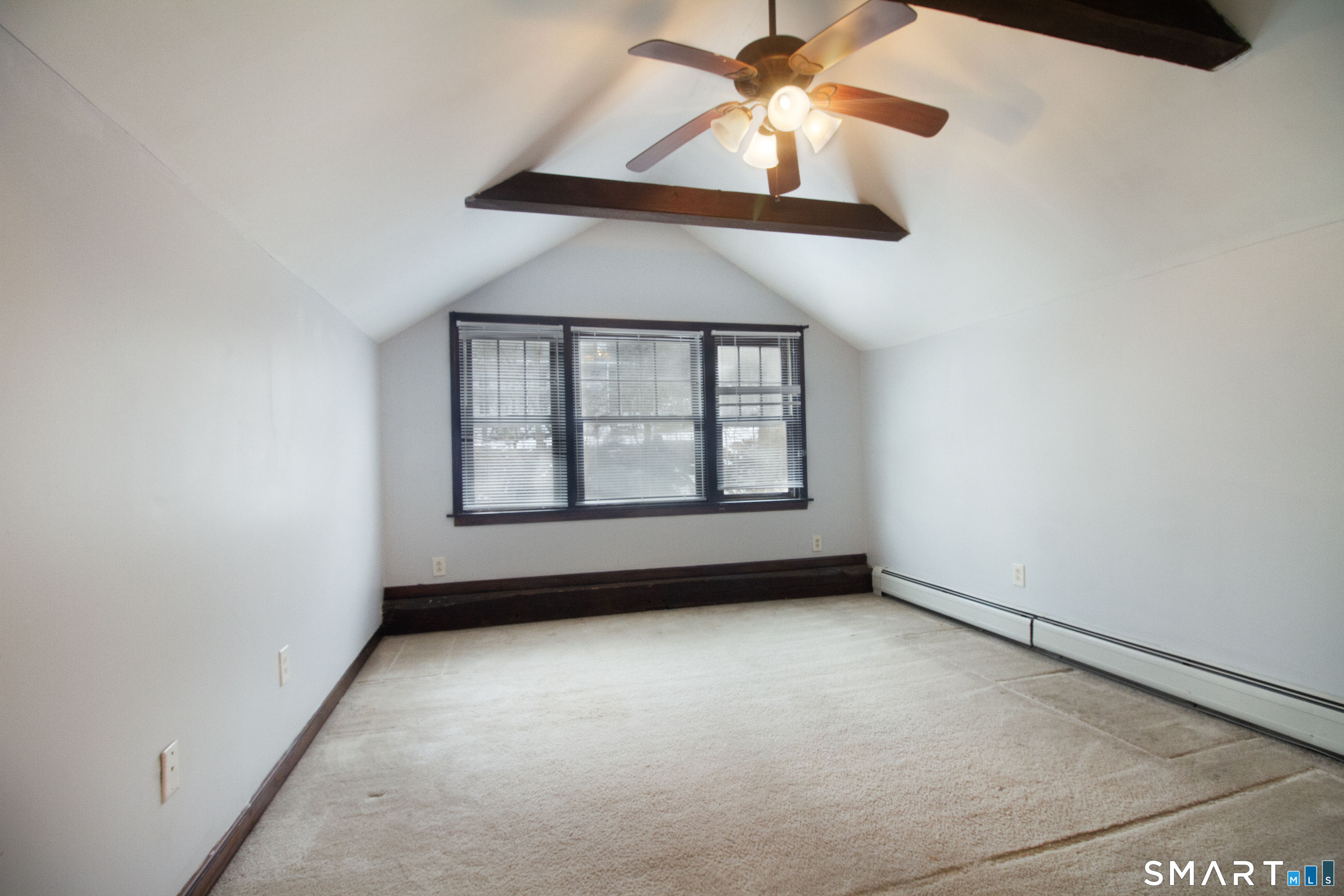 21 B Hoydens Hill Road Fairfield, CT 06824 - Photo 31 of 39 an empty room with a window and a fan