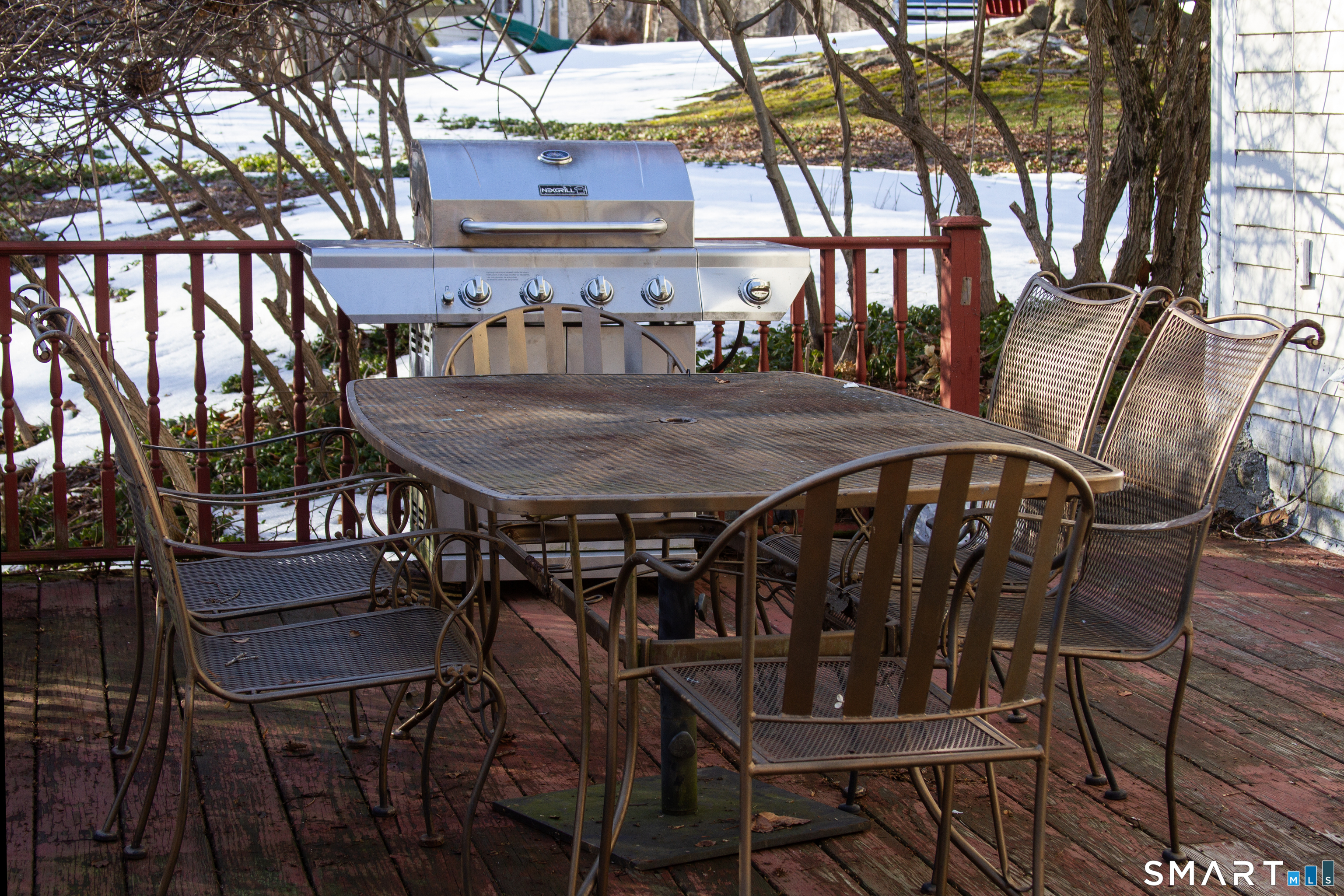 21 B Hoydens Hill Road Fairfield, CT 06824 - Photo 5 of 39 a view of a chairs and table in the patio