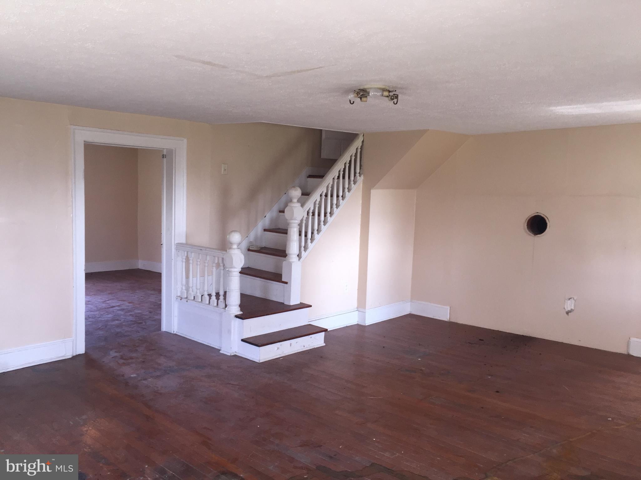 1390 Welltown Road Clear Brook, VA 22624 - Photo 7 of 14 Living room with flue for woodstove