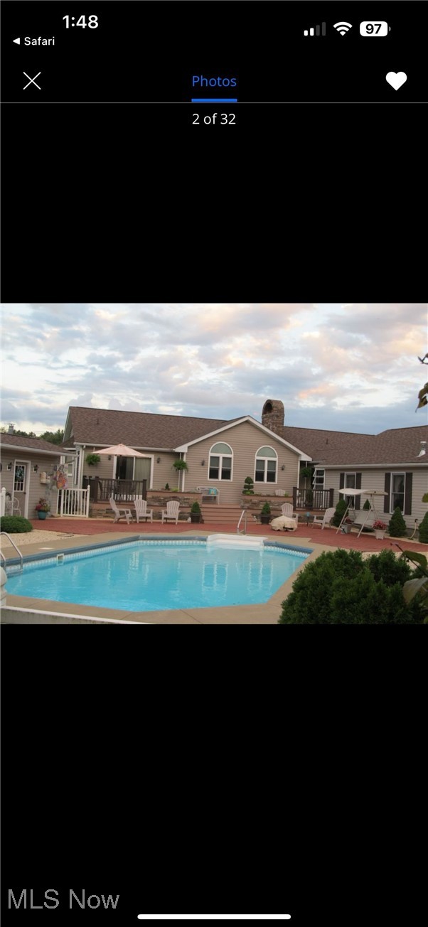 5915 Downs Road Northwest Warren, OH 44481 - Photo 40 of 50 View of pool featuring a patio area
