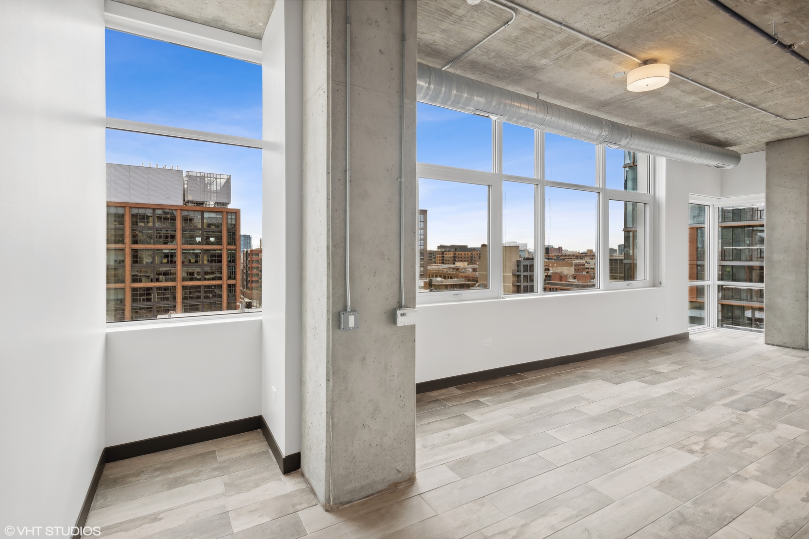 171 North Aberdeen Street, Unit 912 Chicago, IL 60607 - Photo 3 of 21 a view of an empty room with a window