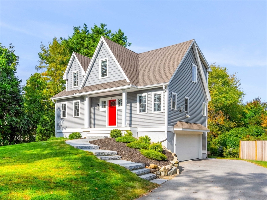 84 Ferry Road Salisbury, MA 01952 - Photo 1 of 42 a front view of a house with a yard and potted plants