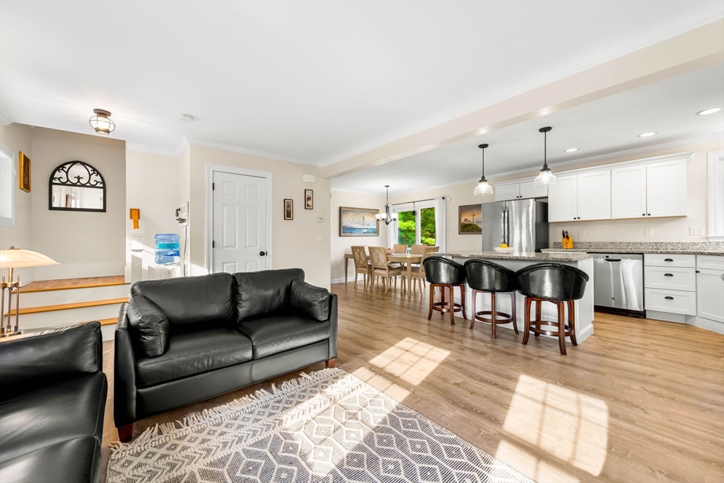 84 Ferry Road Salisbury, MA 01952 - Photo 11 of 42 a living room with furniture and a wooden floor