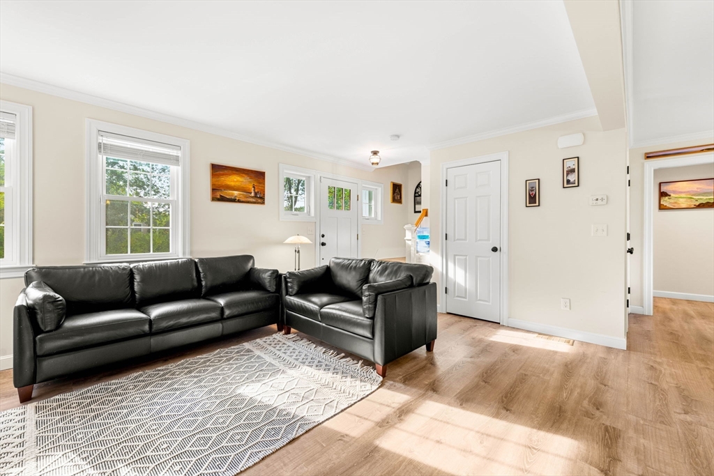 84 Ferry Road Salisbury, MA 01952 - Photo 14 of 42 a living room with furniture and a window