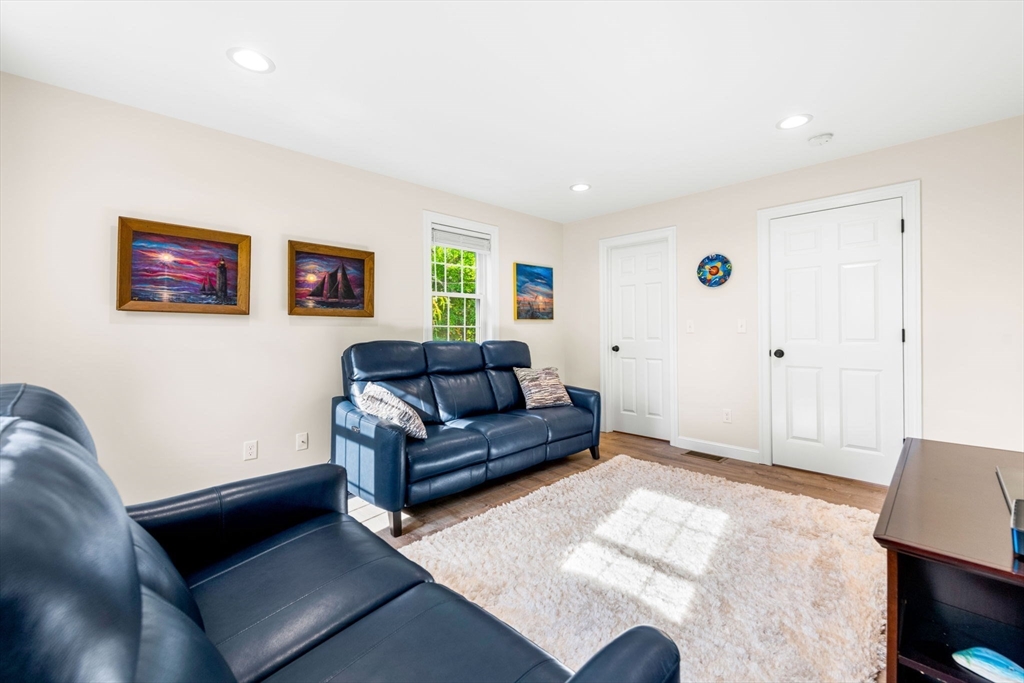 84 Ferry Road Salisbury, MA 01952 - Photo 20 of 42 a living room with furniture and a window