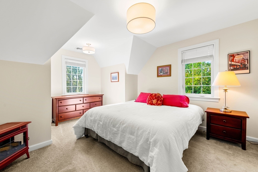 84 Ferry Road Salisbury, MA 01952 - Photo 32 of 42 a bedroom with a bed and a window