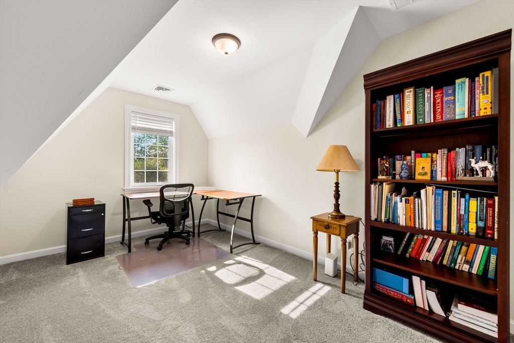 84 Ferry Road Salisbury, MA 01952 - Photo 34 of 42 a view of a workspace with bookshelf and a window